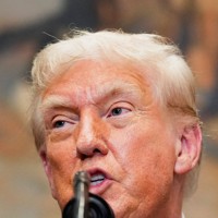 米ホワイトハウスで演説するトランプ大統領＝2025年7月31日、ロイター