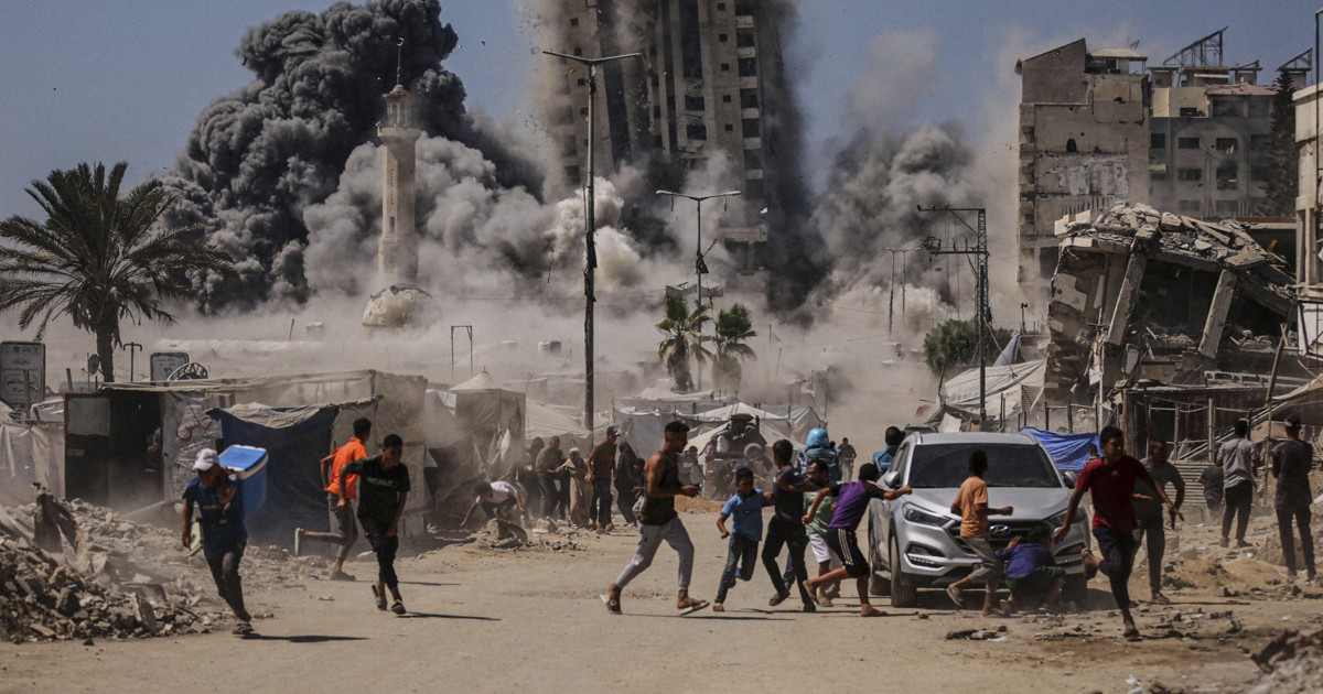 Israel strikes high-rise building and threatens to hit more in Gaza City offensive