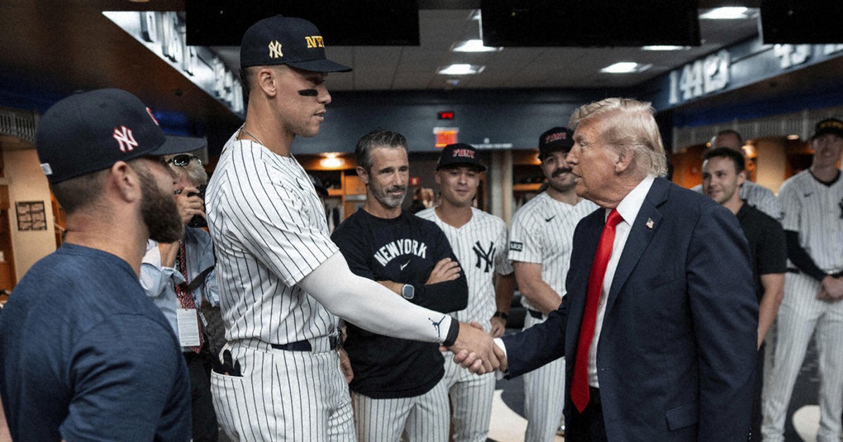 Trump draws cheers and boos while marking 9/11 by attending a New York Yankees game