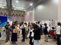 Visitors gather at companies' booths at a job information fair aimed at those working at the Expo 2025 Osaka, Kansai, in Osaka's Suminoe Ward, Sept. 14, 2025. (Mainichi/Tatsu Shingu)