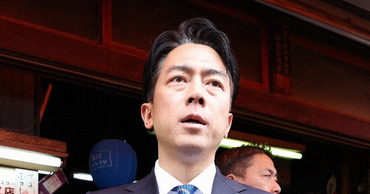 Japan PM hopeful Koizumi sorry over requests for positive online comments