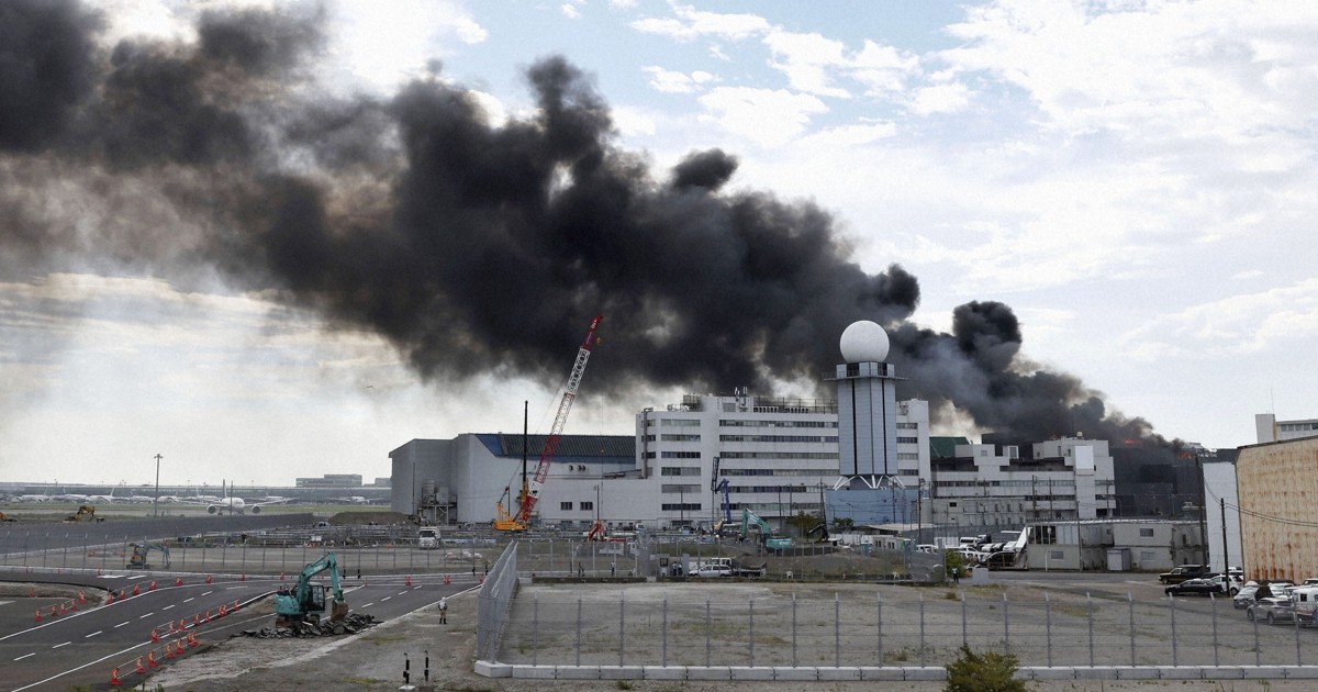 Demolition site fire burns at Tokyo's Haneda airport, flights unaffected