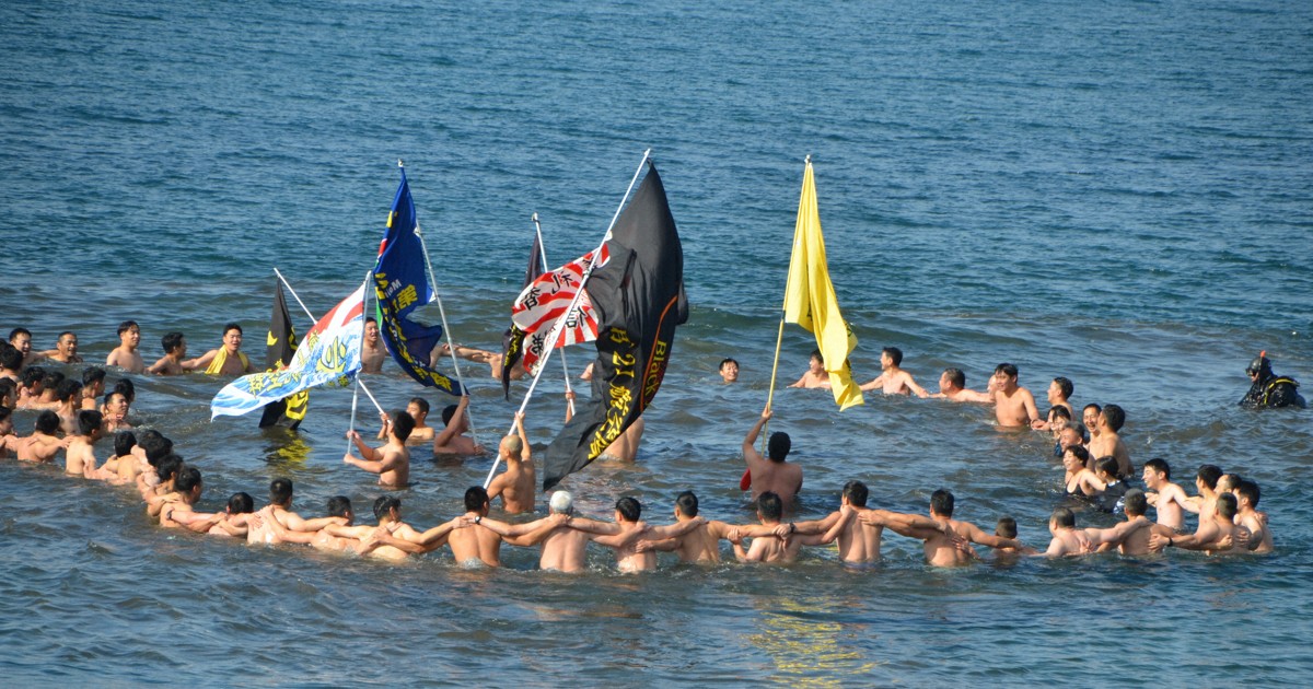 East Japan city sinks 70-yr-old winter swimming event due to high burden