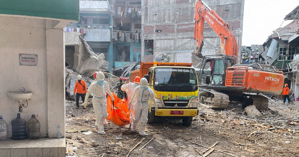 Indonesian rescuers search for missing students after school collapse kills 49