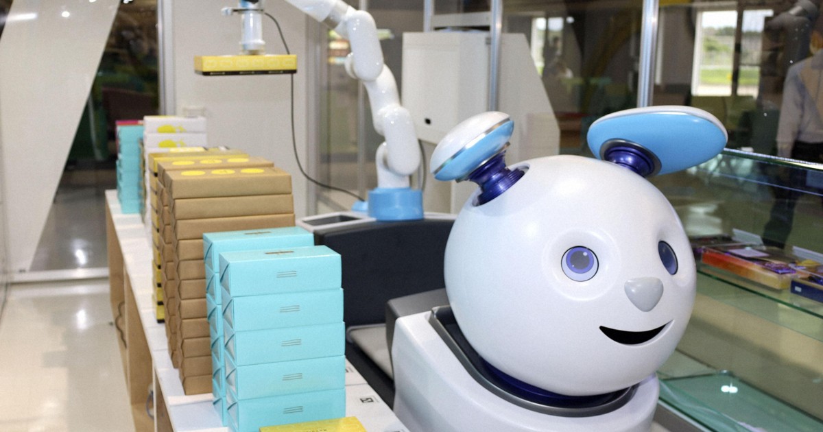 Japan's Narita airport opens unmanned souvenir shop with cat-like robot