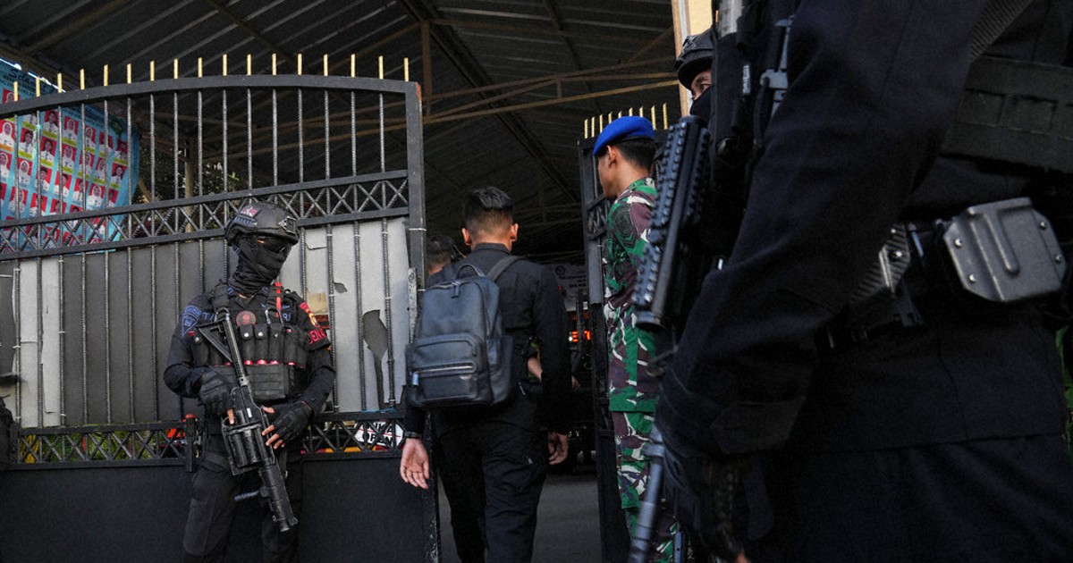 Multiple explosions shake a mosque in an Indonesian high school and injure 54