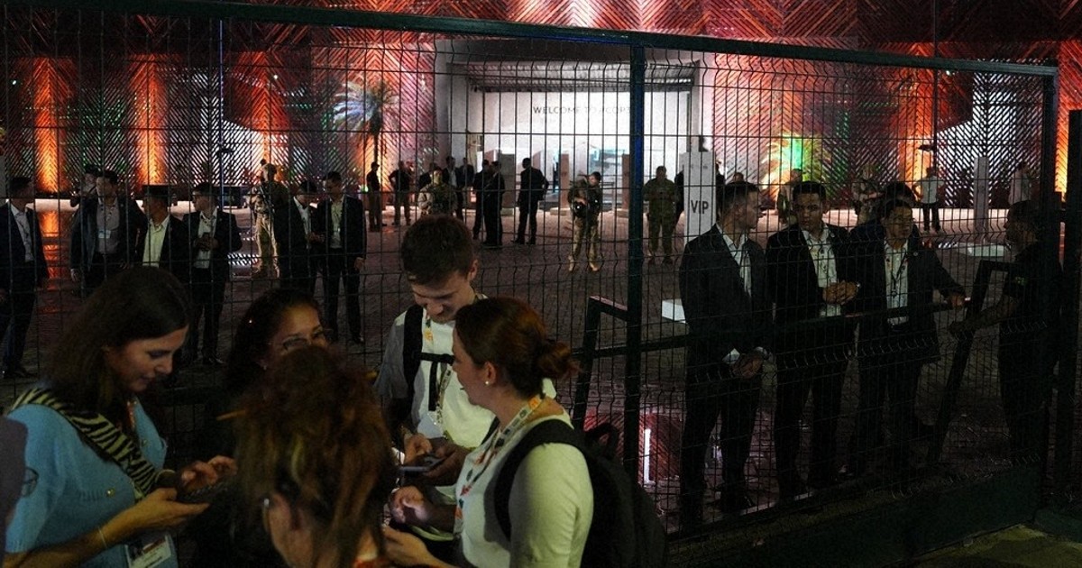 Protesters confront security at main venue of UN climate talks