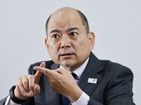 Daigo Ishibashi, president of the Japanese Federation of the Deaf, speaks during an interview in Tokyo on Nov. 7, 2025. (Kyodo)
