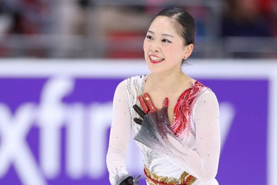 女子フリーの演技を終えて笑顔を見せる吉田陽菜＝米レークプラシッドで2025年11月16日、猪飼健史撮影