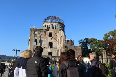 Many foreign tourists visit the Atomic Bomb Dome in Hiroshima's Naka Ward on Nov. 15, 2025. (Mainichi/Deockwoo An)