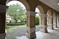 A row of columns with arches along a first-floor corridor facing the courtyard is seen at the former main building of the Kyoto Prefectural Government in the city of Kyoto's Kamigyo Ward, Aug. 9, 2023. (Mainichi/Ai Kawahira)