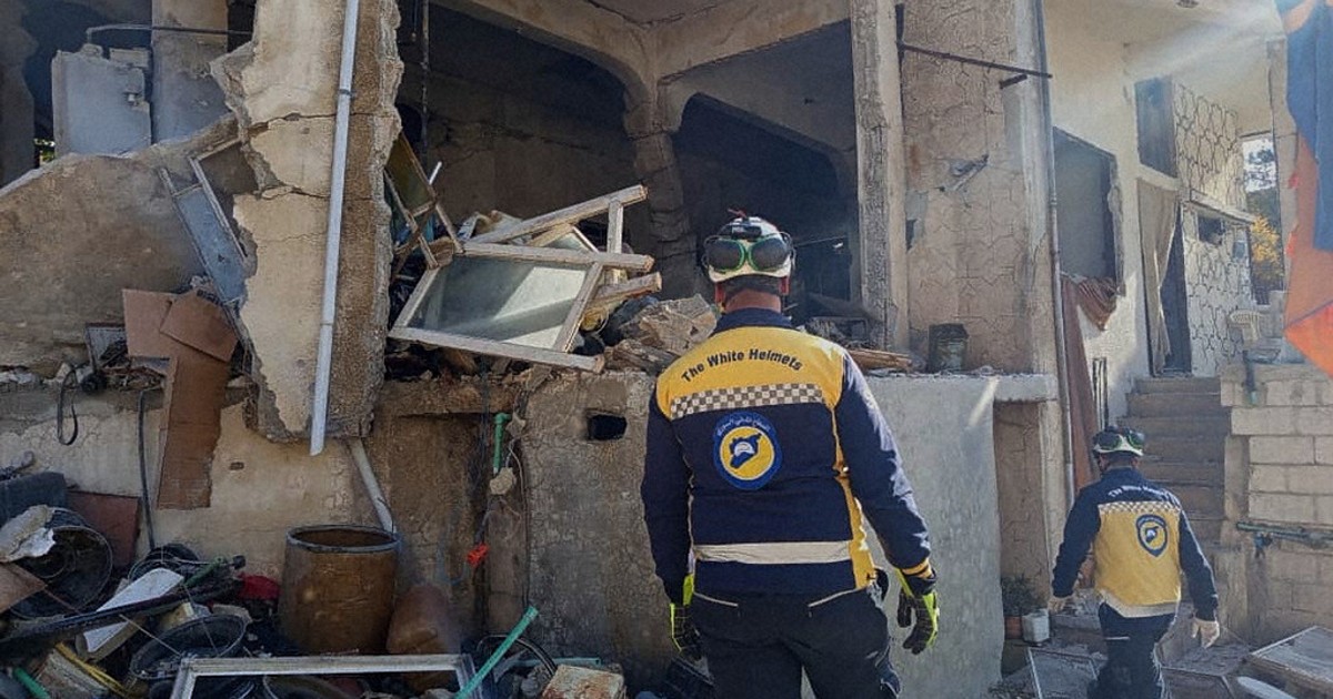 Israeli forces kill at least 13 people in Syria raid, officials and residents say