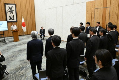 Prime Minister Shigeru Ishiba, left background, delivers instructions to staff during an inauguration ceremony for the Office for a Society of Orderly and Harmonious Coexistence with Foreign Nationals, at the prime minister's office on July 15, 2025. (Mainichi/Akihiro Hirata)