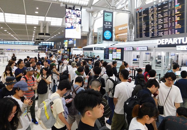 Why is the Japanese gov't raising the departure tax?