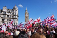 People demonstrate during the Tommy Robinson-led Unite the Kingdom march and rally, in London, Saturday, Sept. 13, 2025. (AP Photo/Joanna Chan, File)