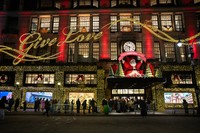 Black Friday shoppers wait in line to enter Macy's flagship store on Friday, Nov. 28, 2025 in New York. (AP Photo/Angelina Katsanis)