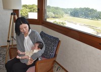 A mother and her 2-month-old daughter use a postpartum care hotel in Fukuoka's Higashi Ward in this November 2025 file photo. (Mainichi/Haruna Tasaki)
