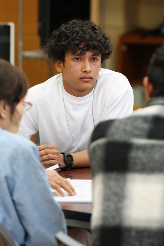 Nepalese man in Fukuoka enjoys interacting with locals, revitalizing aging community