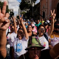 Government supporters demand President Nicolas Maduro's release from U.S. custody during a protest in Caracas, Venezuela, Jan. 4, 2026. (AP Photo/Ariana Cubillos)