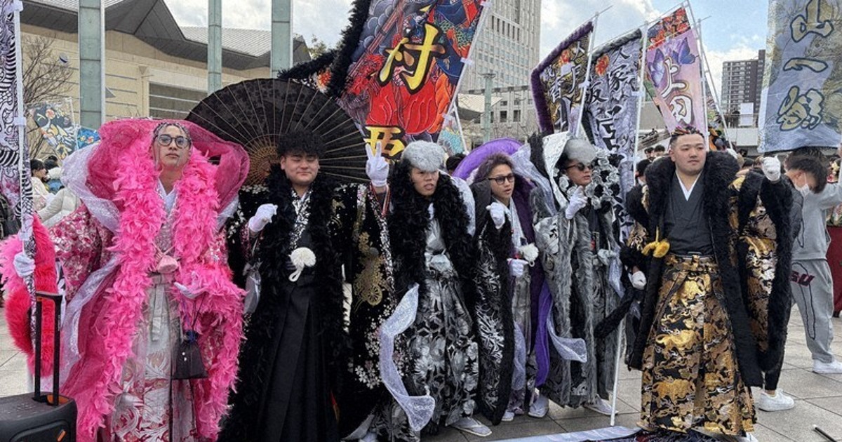 New 20-yr-olds show off flashy outfits at ceremony in southwest Japan