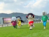 Mascots from Kitakyushu Intercity Linkage member municipalities sprint down the turf course at Kokura Racecourse in Kitakyushu's Kokuraminami Ward, Feb. 1, 2026, in this photo taken from the racecourse's Instagram account.