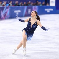 女子SPで演技する坂本花織＝ミラノ・アイススケートアリーナで2026年2月17日、猪飼健史撮影