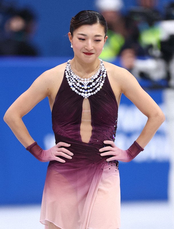 女子フリーの演技を終えて複雑な表情を見せる坂本花織＝ミラノ・アイススケートアリーナで2026年2月19日、猪飼健史撮影
