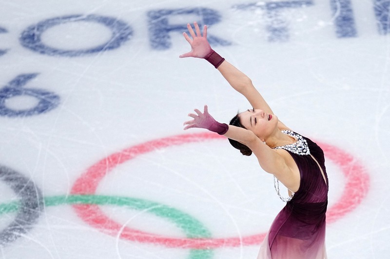 女子フリーで、最後の振り付けをして演技を終える坂本花織＝ミラノ・アイススケートアリーナで2026年2月19日、貝塚太一撮影