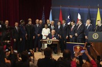 President Donald Trump signs a proclamation committing to countering cartel criminal activity at the Shield of the Americas Summit, on March 7, 2026, at Trump National Doral Miami in Doral, Fla. (AP Photo/Rebecca Blackwell)