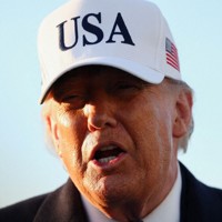 記者団の取材に応じるトランプ米大統領＝東部メリーランド州で2026年3月13日、ロイター