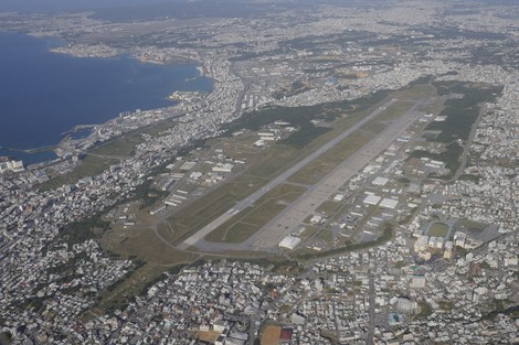 U.S. Marine Corps Air Station Futenma, surrounded by residences, is seen in the Okinawa Prefecture city of Ginowan in this photo taken from the Mainichi Shimbun's aircraft Kibo on Dec. 8, 2023. (Mainichi)