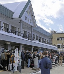 This file photo taken on Jan. 31, 2026, shows the outside of JR Hakuba Station in Hakuba, Nagano Prefecture, crowded with tourists and others. (Kyodo)