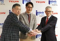 Junya Toguchida, right, assistant director at the Kyoto University's Center for iPS Cell Research and Application, and others pose for a photo after a press conference in Kyoto on March 16, 2026. (Kyodo)