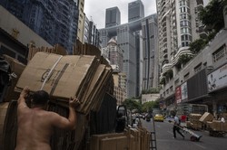 中国国内の激しい競争が価格と利益の低下を招いている＝Gilles Sabrie for WSJ