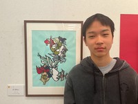Ken and his favorite work are seen at the Nogata Tanio Art Museum in Nogata, Fukuoka Prefecture, on March 15, 2026. (Mainichi/Takashi Okamura)