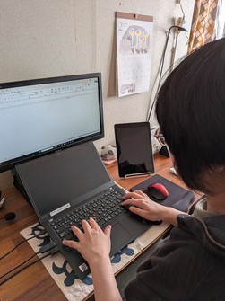 A home workspace of an employee who works remotely is pictured in this photo provided by the individual.