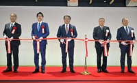 This photo shows an opening ceremony of new facilities of Rapidus Corp. in Hokkaido on April 11, 2026, attended by Economy, Trade and Industry Minister Ryosei Akazawa, center, Rapidus Chairman Tetsuro Higashi, 2nd from right, and Rapidus CEO Atsuyoshi Koike, far right. (Kyodo) 