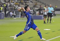 Kotaro Hayashi of Machida Zelvia delivers a long throw-in, leading to the winning goal during an Asian Champions League Elite football quarterfinal against Al Ittihad in Jeddah, Saudi Arabia, on April 17, 2026. (Kyodo) 