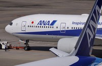 ANA planes are pictured at Haneda airport in Tokyo on April 12, 2026. (Kyodo)