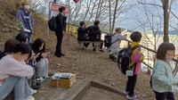 People are seen after evacuating to a park on high ground following a tsunami warning, in Kamaishi, Iwate Prefecture, April 20, 2026. (Mainichi/Shinichi Okuda)