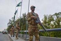 Soldiers take positions on an overhead bridge to ensure security in Islamabad, Pakistan, April 24, 2026. (AP Photo/M.A. Sheikh)