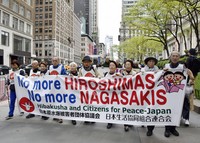 A march led by survivors of the U.S. atomic bombings of Hiroshima and Nagasaki is held in New York on April 26, 2026. (Kyodo)