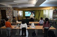 This photo shows a class being held at Hanaso Lab in Tokyo's Meguro Ward in February 2026. (Kyodo) 