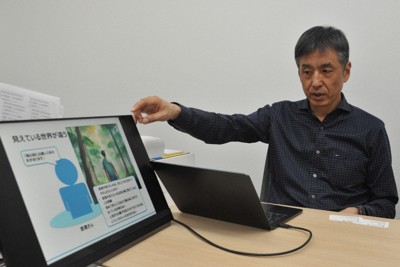 認知行動工学について説明する大阪大大学院人間科学研究科の平井啓教授＝大阪府吹田市の「大阪大学・日本財団感染症センター」で2026年4月15日午後1時13分、近藤諭撮影