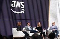 Denise Dresser, chief revenue officer of OpenAI, second right, speaks on stage with Julia White, vice president & chief marketing officer, AWS, from left, Matt Garman, CEO of AWS, and Anthony Liguori, vice president and distinguished engineer, AWS, at a What's Next with AWS event, on April 28, 2026, in San Francisco. (AP Photo/Jeff Chiu)
