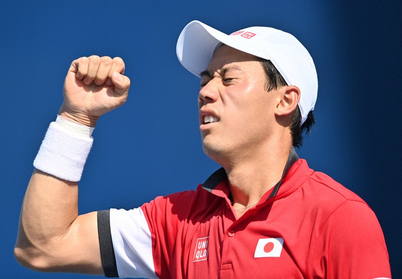 男子シングルス3回戦でブルガリアのイリヤ・イワシュカにストレート勝ちして喜ぶ錦織圭＝有明テニスの森公園で2021年7月28日、宮間俊樹撮影