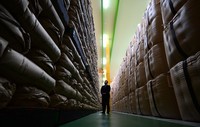 Stockpiled rice is stacked nearly to the ceiling inside a warehouse in Saitama Prefecture on Feb. 18, 2025. (Mainichi/Kaho Kitayama)