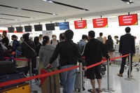 People line up to check in for the first flight from Shizuoka to Hanoi at Mt. Fuji Shizuoka Airport in the city of Makinohara, Shizuoka Prefecture, on April 28, 2026. (Mainichi/Shiho Fujibuchi)