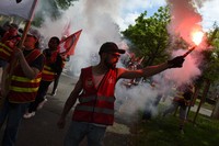 Protesters march during the May Day demonstration in Rennes, western France, Friday, May 1, 2026. (AP Photo)