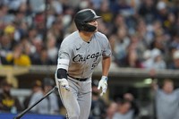 Chicago White Sox's Munetaka Murakami watches his three-run home run during the second inning of a baseball game against the San Diego Padres Friday, May 1, 2026, in San Diego. (AP Photo/Gregory Bull)